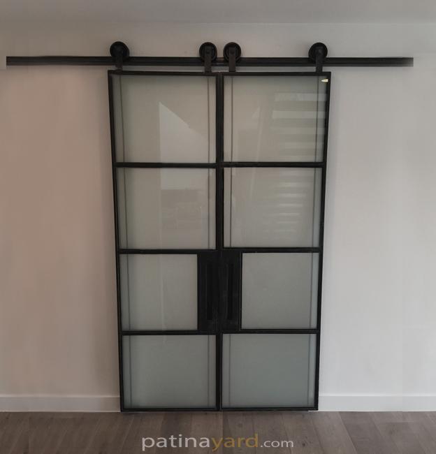 blacken steel and satin glass barn door