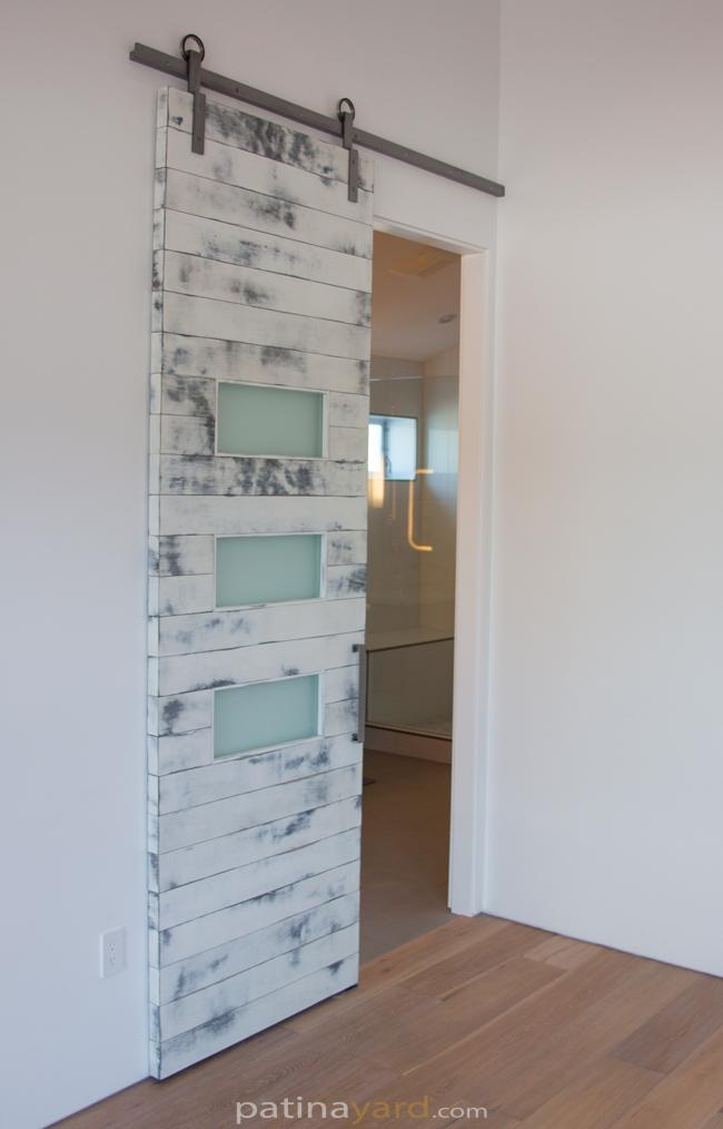 weathered white barn doors with satin glass
