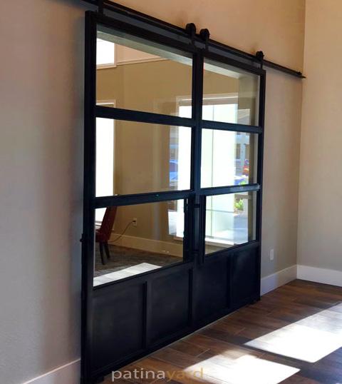 steel patina double barn doors with clear tempered glass and metal tow kick