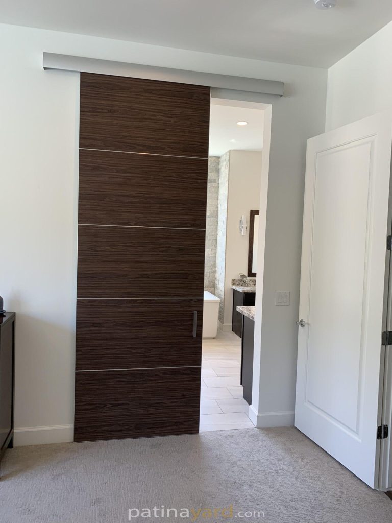 Bella laminate oak door with stainless seams