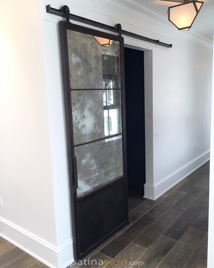 Antique Mirror and Metal Barn Door