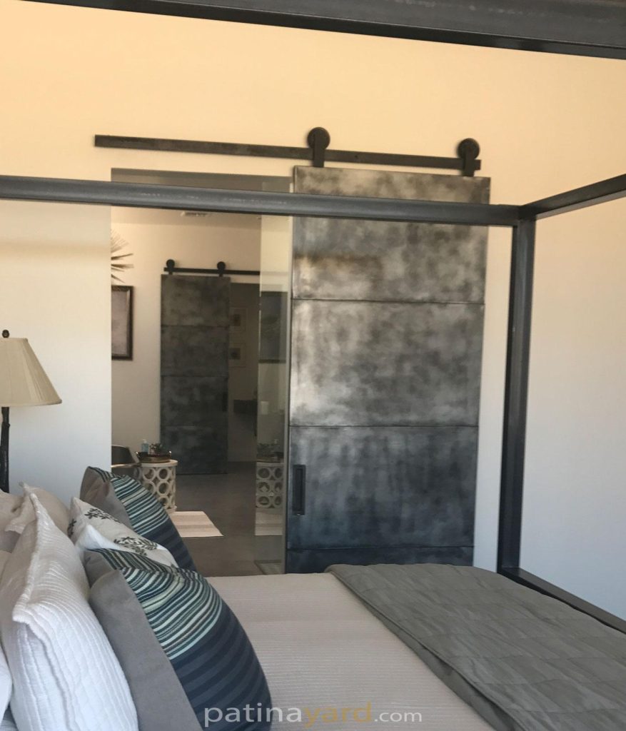 patina zinc barn door and custom hardware