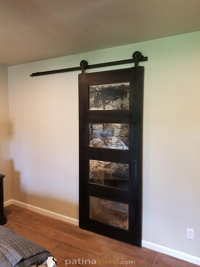 Charred wood antique mirror barn doors