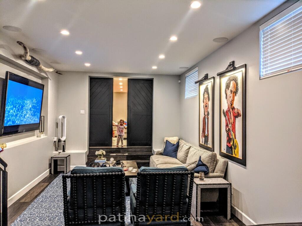 theater room double wood barn doors
