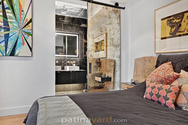 single antique mirror barn door with metal flat bar frame