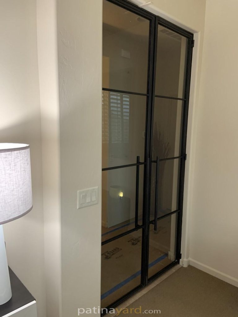 master bedroom contemporary metal and glass doors