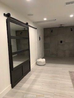 master closet mirror and metal barn door