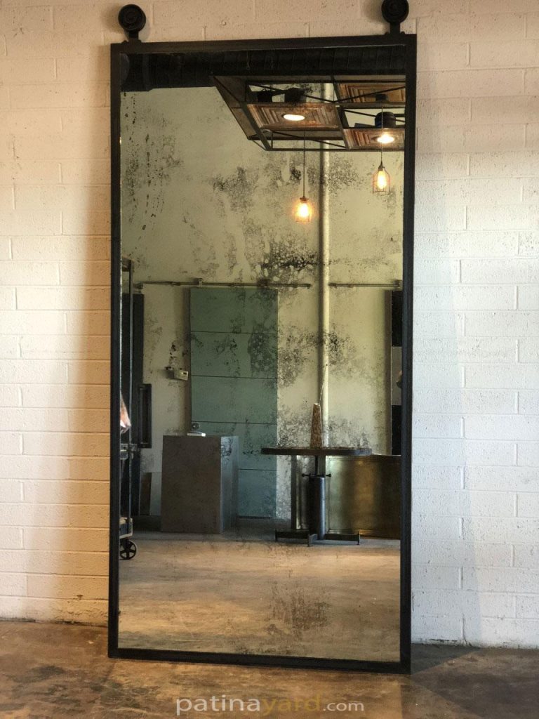 antique mirror with blackened frame