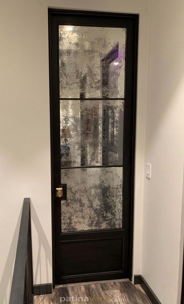 hinged antique door with toe kick
