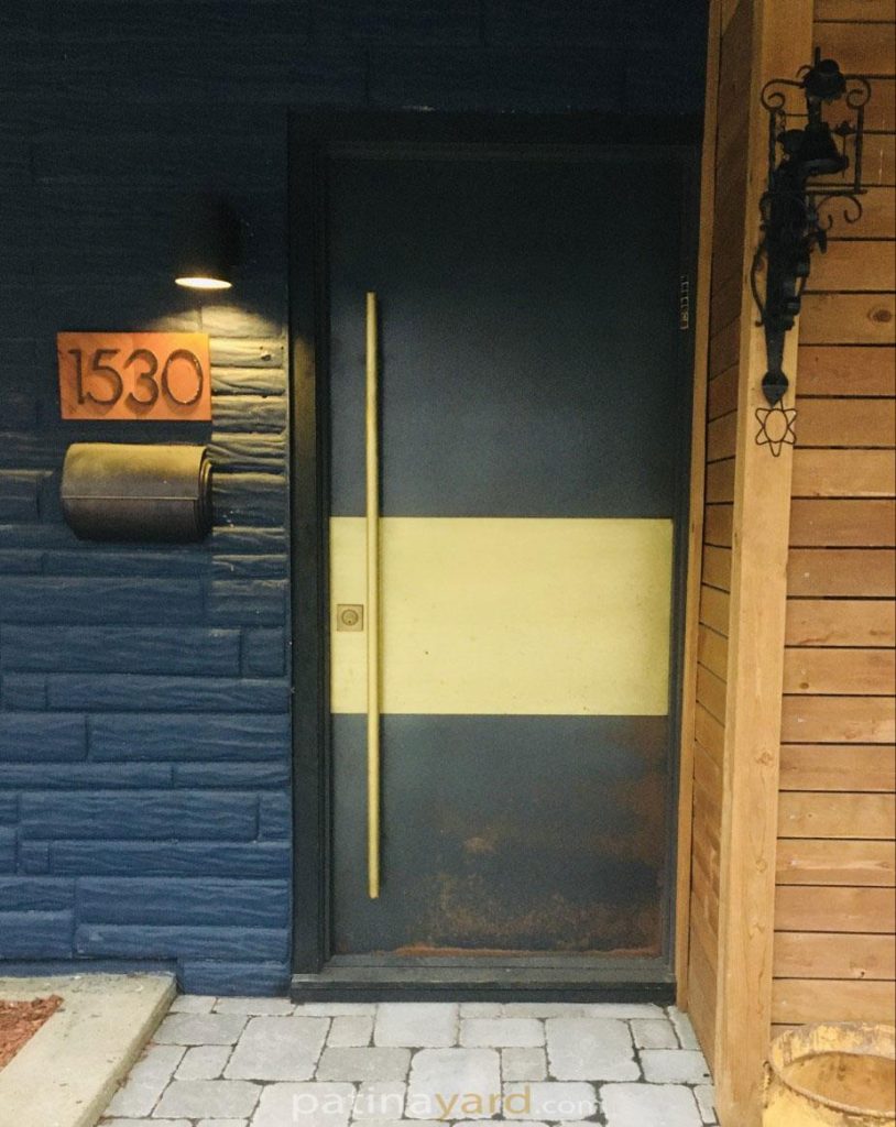 entry door brass and hot rolled steel with custom brass handle