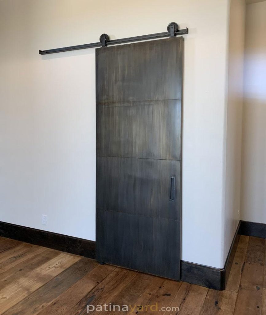 patina metal panel barn door