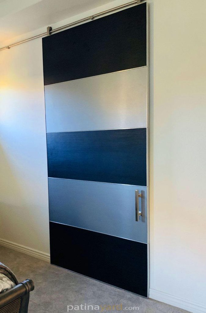 laminate modern barn door with stainless