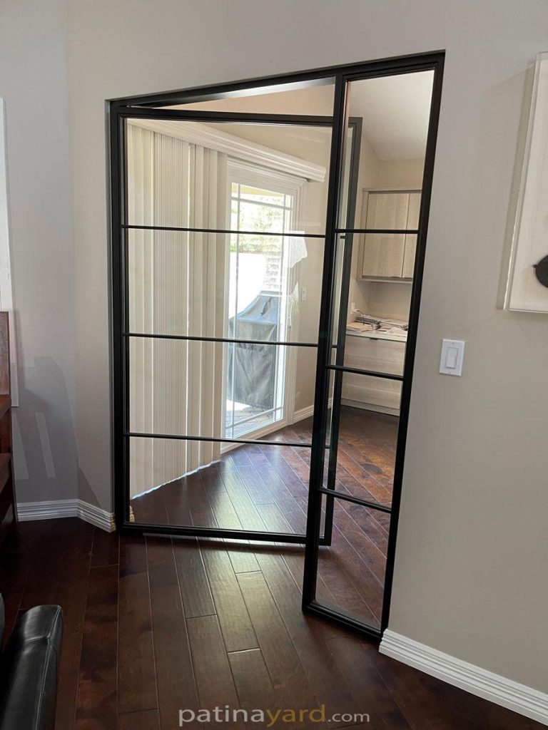 interior metal and glass pivot door