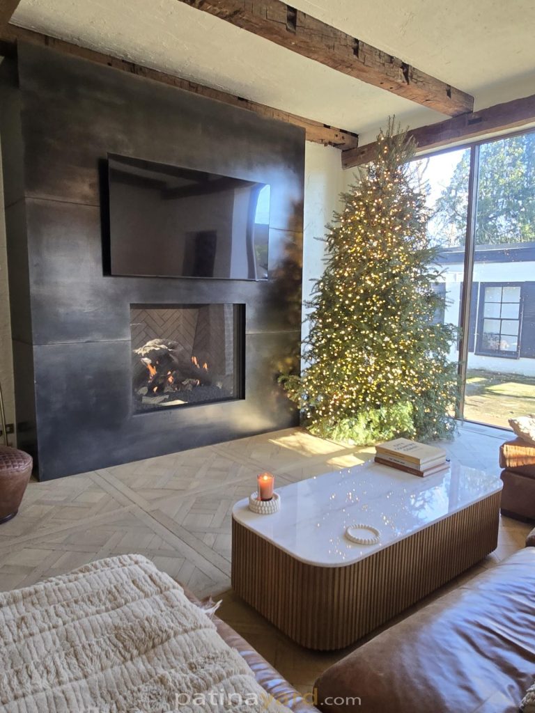 metal fireplace surround with large panels