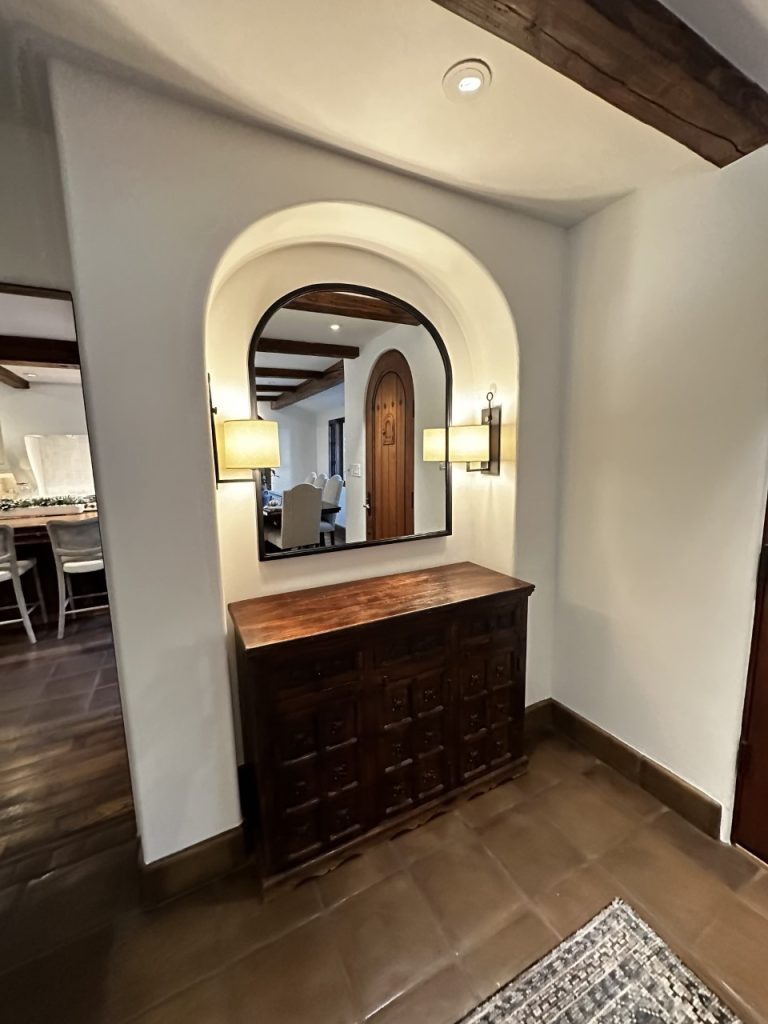 Arch mirror with blacken steel frame