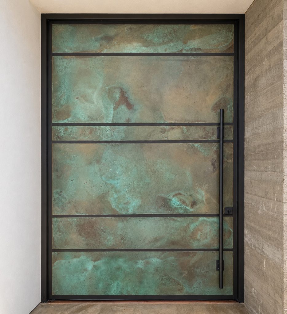 large copper pivot door custom made